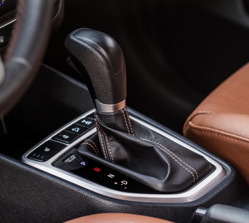 Professional Transmission Services in Buffalo, NY​. Modern automatic gearbox. Close up of the gearbox transmission handle. Automatic gear stick.