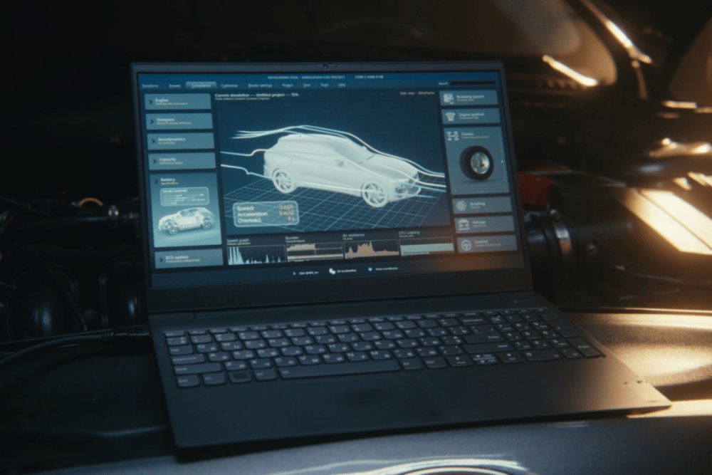 ADAS Calibration in Tonawanda by Total Automotive -- Laptop on a car engine displays vehicle diagnostics